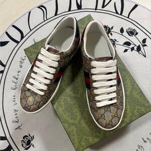 Gucci Women's Beige and Black Sneakers with Red Accents